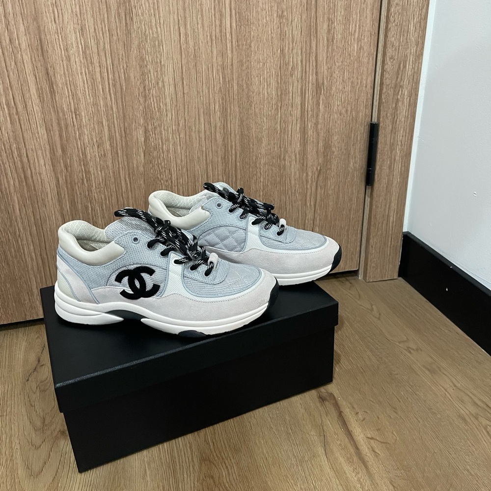 Chanel sneakers worn once . Great condition and original packaging .